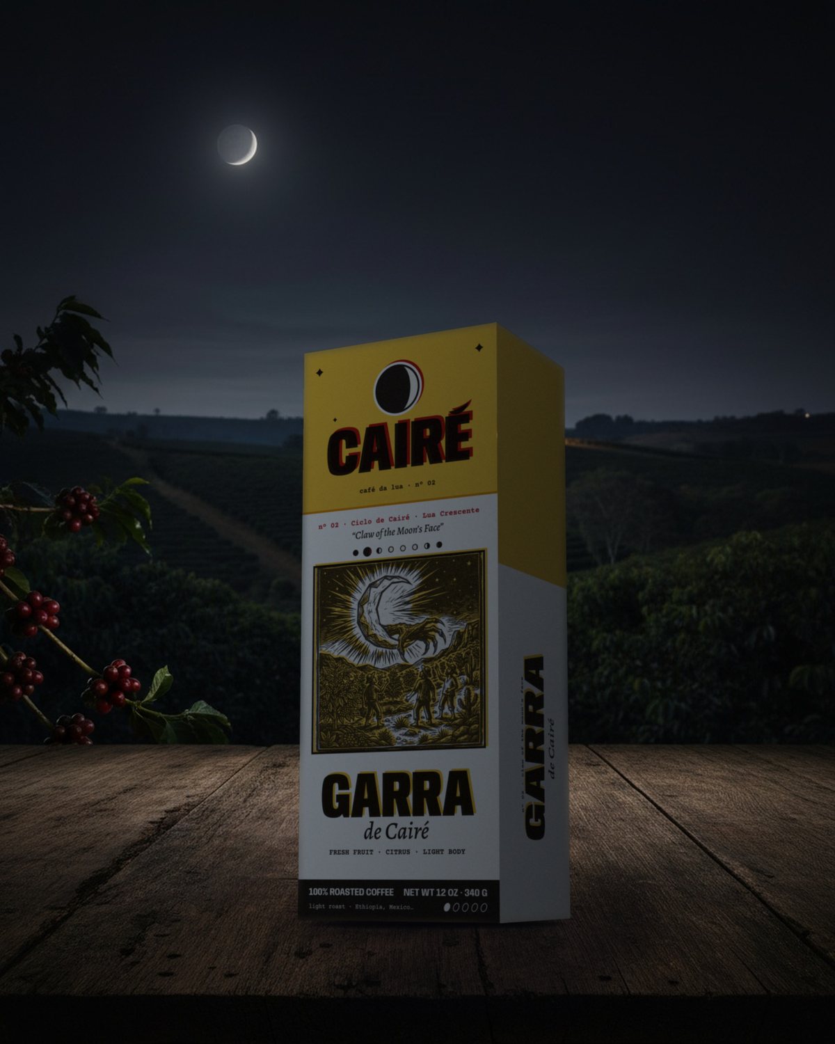 Garra de Cairé box at night, on a table above the coffee trees, a thin moon overhead